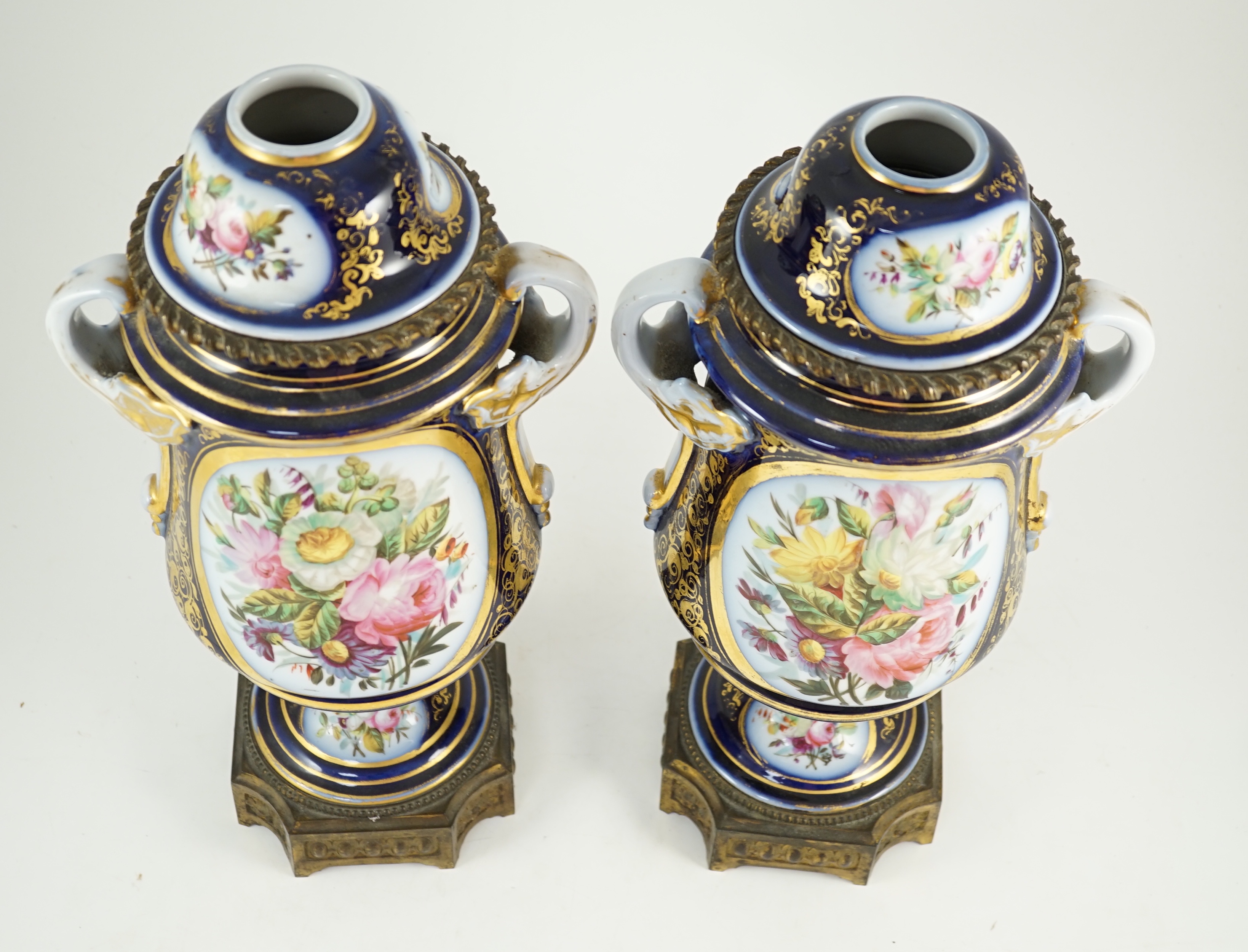 A pair of Sevres style Paris porcelain and ormolu mounted oil lamps, late 19th century, 43 cm high